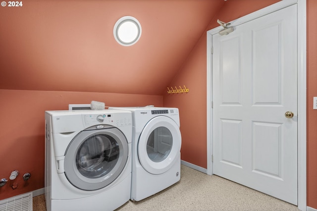 washroom with independent washer and dryer