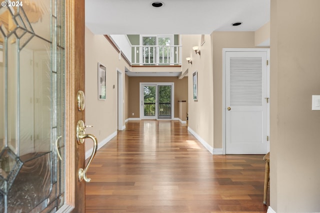 foyer entrance featuring dark hardwood / wood-style floors