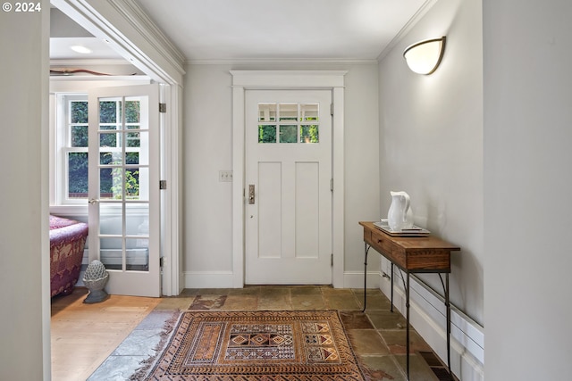 entryway with french doors and ornamental molding