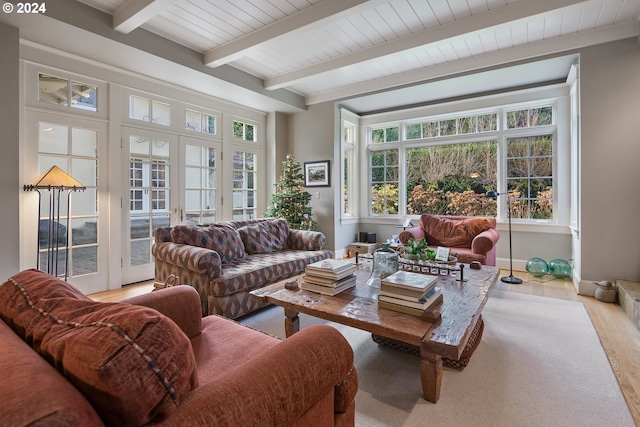 sunroom with french doors and beamed ceiling