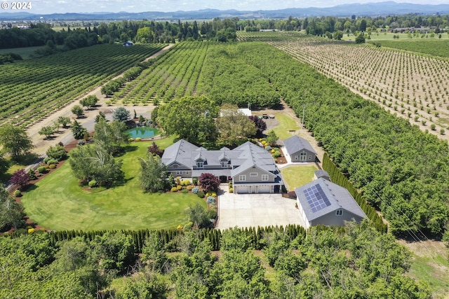 birds eye view of property featuring a rural view