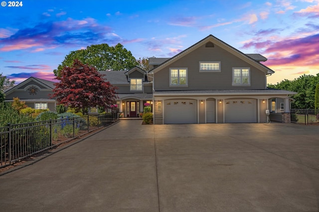 view of front of property featuring a garage