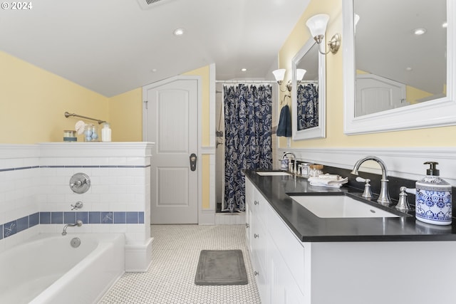 bathroom with vanity, tile patterned floors, and separate shower and tub