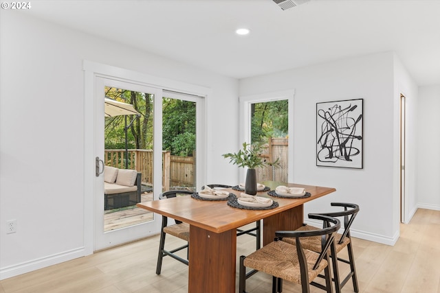 dining space featuring light hardwood / wood-style flooring