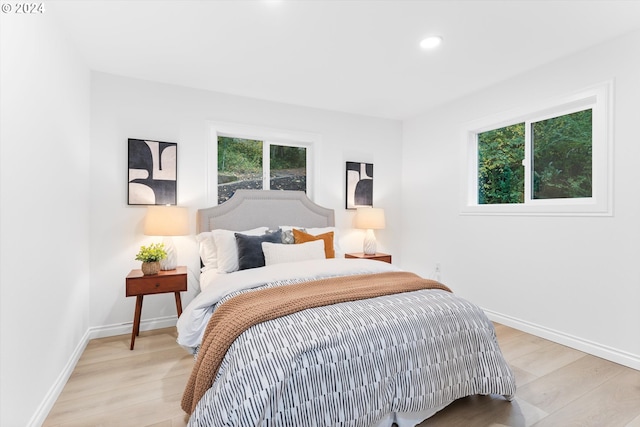 bedroom featuring light hardwood / wood-style floors