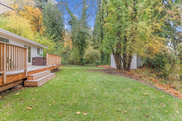 view of yard featuring a wooden deck