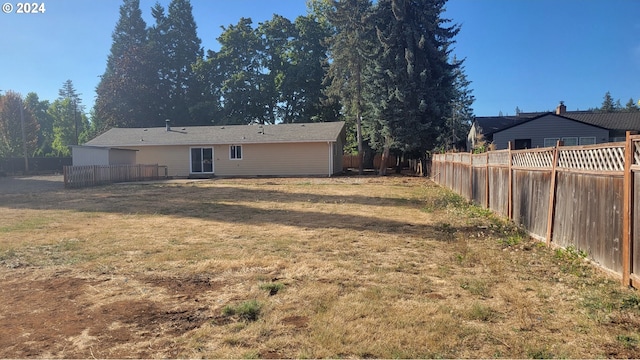 exterior space featuring a fenced backyard