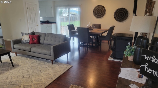 living room with dark wood-type flooring