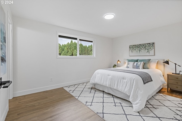 bedroom with light hardwood / wood-style flooring