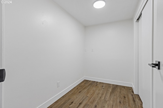 spare room featuring hardwood / wood-style floors