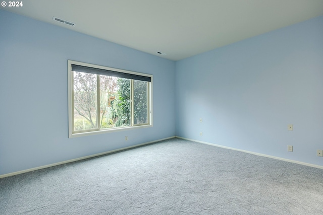 unfurnished room with carpet