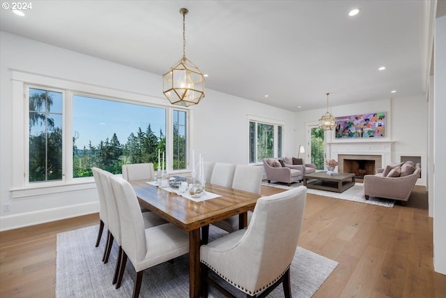 dining area with a healthy amount of sunlight and light wood-type flooring