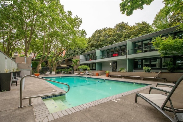 255 SW Harrison St Unit 21C, Portland, OR 97201 - community pool featuring a patio area