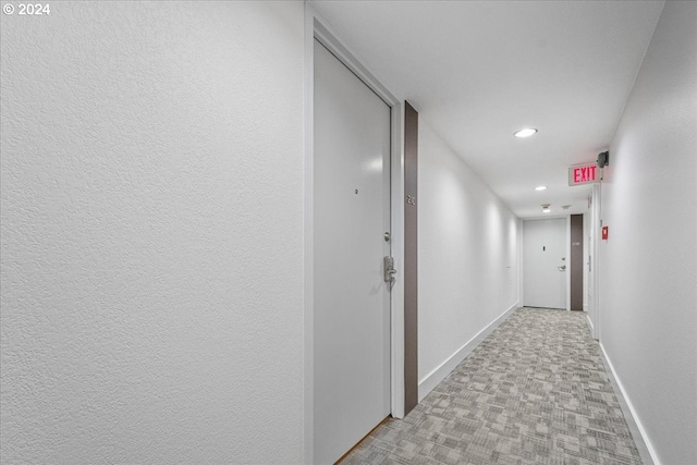 255 SW Harrison St Unit 21C, Portland, OR 97201 - hallway with baseboards, recessed lighting, and light carpet