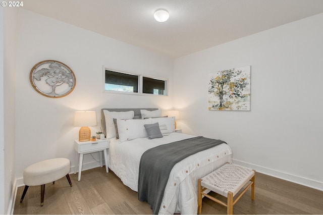 bedroom featuring hardwood / wood-style flooring