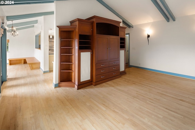 interior space with vaulted ceiling with beams, light hardwood / wood-style flooring, and a chandelier