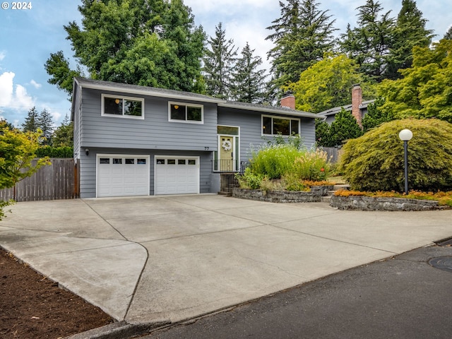 split foyer home featuring a garage