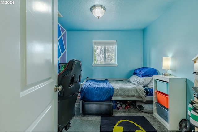 bedroom featuring carpet flooring