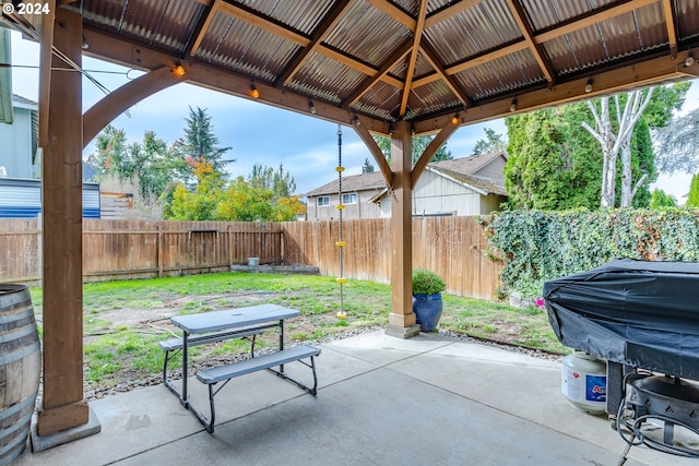 view of patio / terrace featuring a gazebo and grilling area