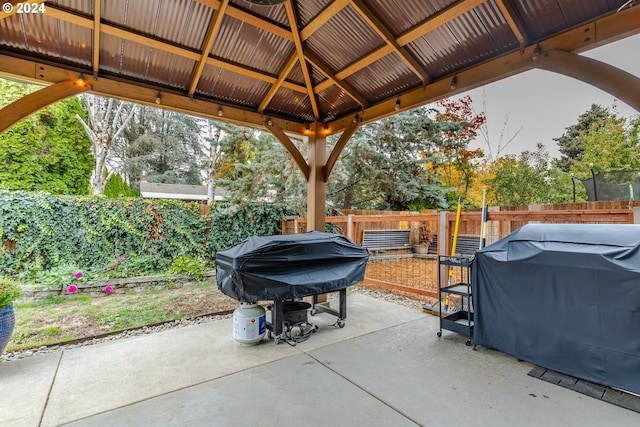 view of patio / terrace with a gazebo and grilling area