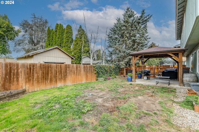 view of yard with a gazebo and a patio area