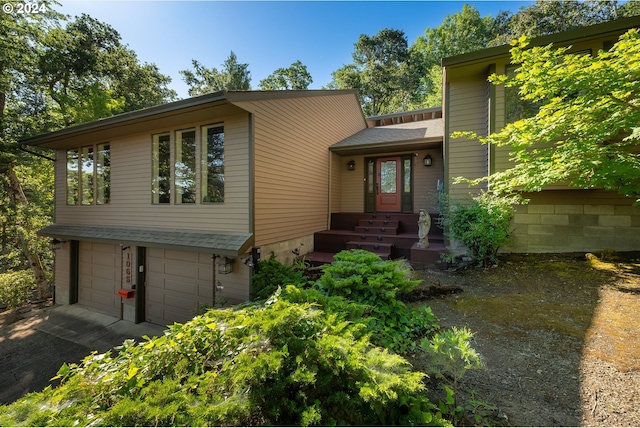 view of front of home featuring a garage