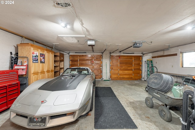 garage featuring a garage door opener