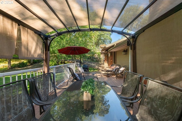 exterior space featuring a deck and a pergola