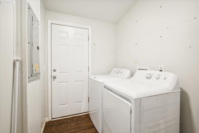 washroom with washer and dryer and dark hardwood / wood-style floors