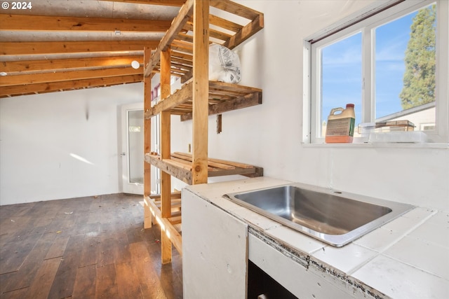 kitchen featuring tile counters and dark hardwood / wood-style flooring