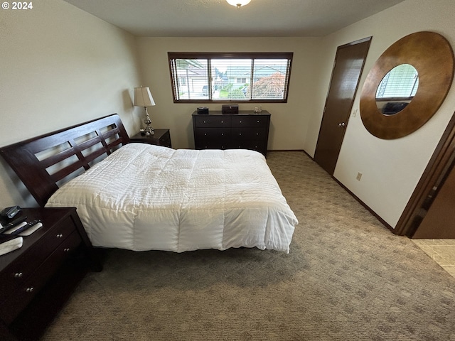 bedroom with light colored carpet