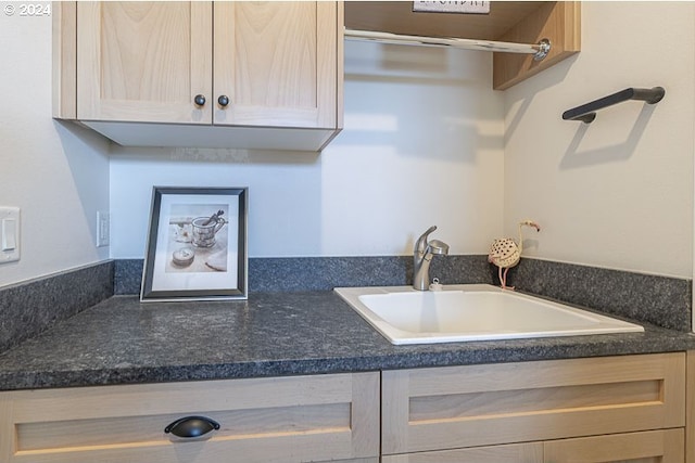 kitchen with sink and light brown cabinets