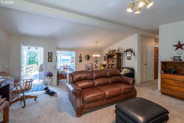 living room featuring vaulted ceiling with beams, light colored carpet, and a chandelier