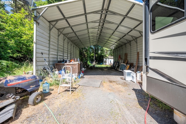 view of vehicle parking with a carport