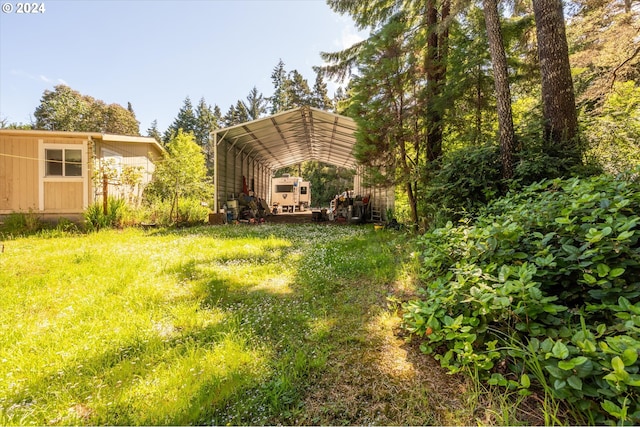 view of yard featuring a carport