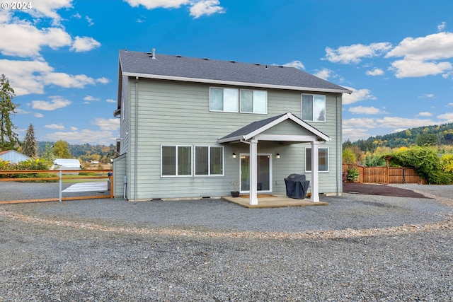 front of property featuring a patio