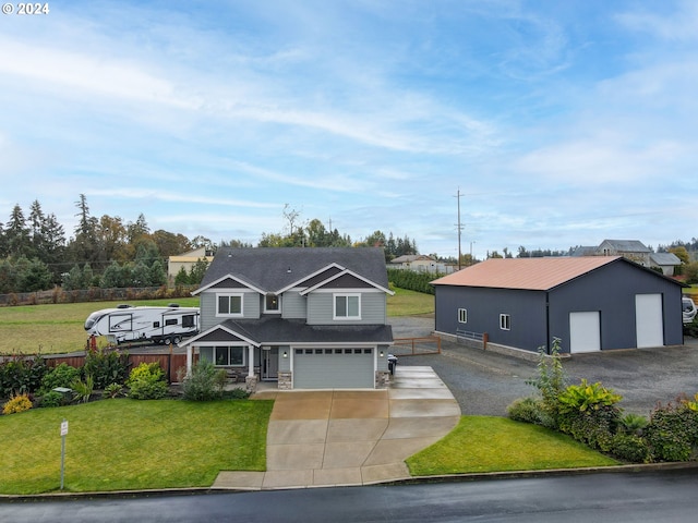 view of front of house featuring a front lawn and a garage