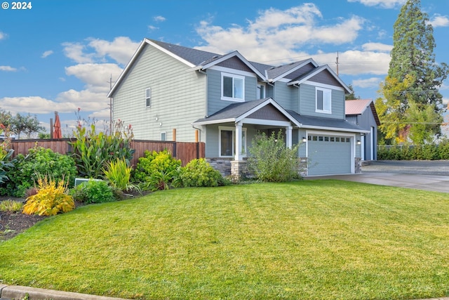 view of front of house with a front lawn and a garage