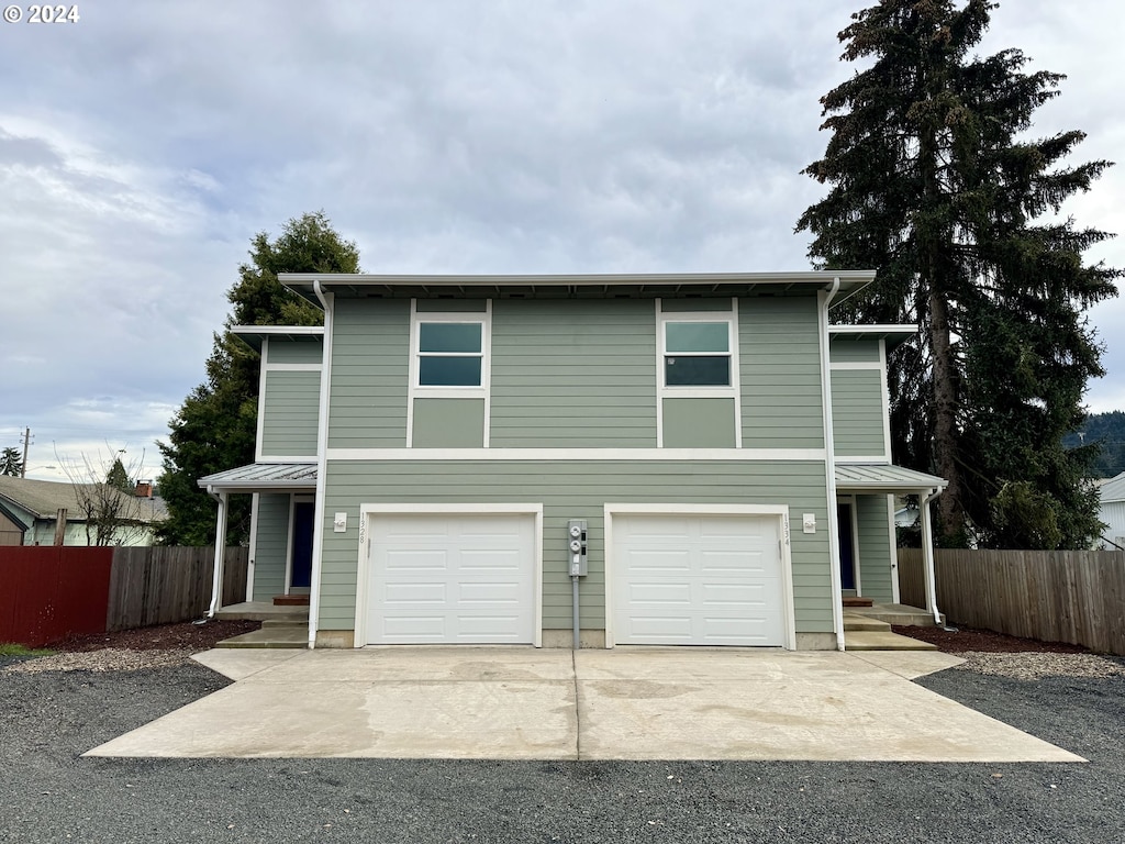 view of front of home with a garage