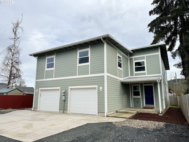 view of front of home with a garage