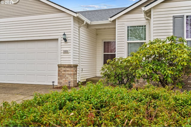 property entrance featuring a garage