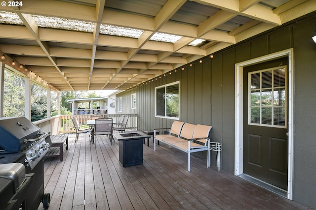 wooden deck featuring grilling area