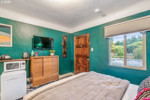 bedroom with a textured wall