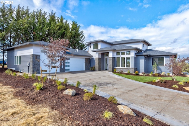 view of front of home with a garage