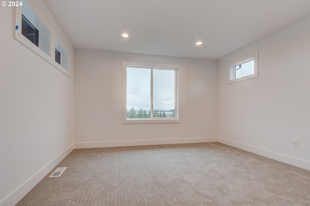 view of carpeted spare room