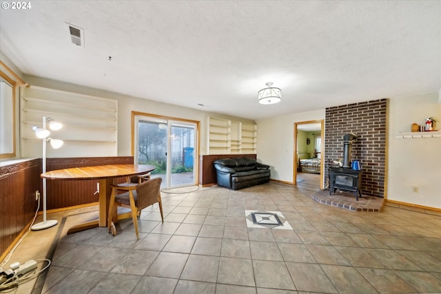 interior space with a wood stove