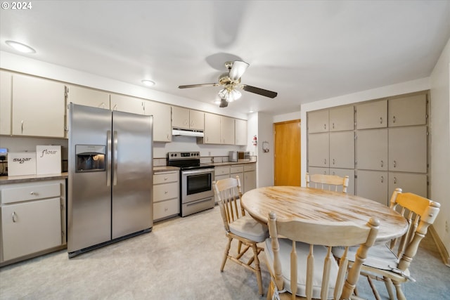 kitchen with ceiling fan and appliances with stainless steel finishes