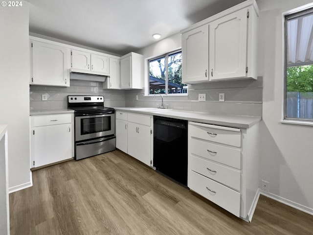 kitchen with white cabinetry, stainless steel electric range, dishwasher, and sink