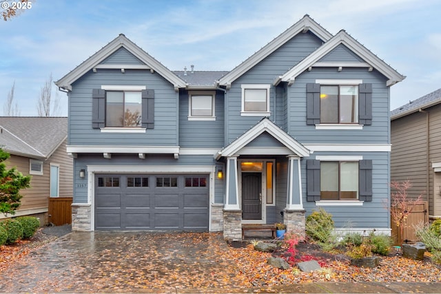 craftsman inspired home featuring a garage