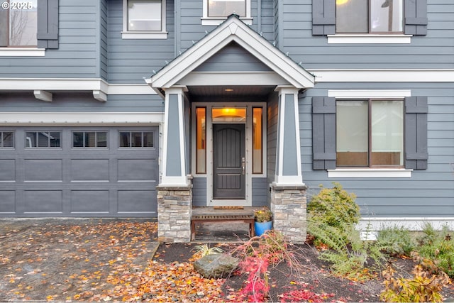 property entrance featuring a garage